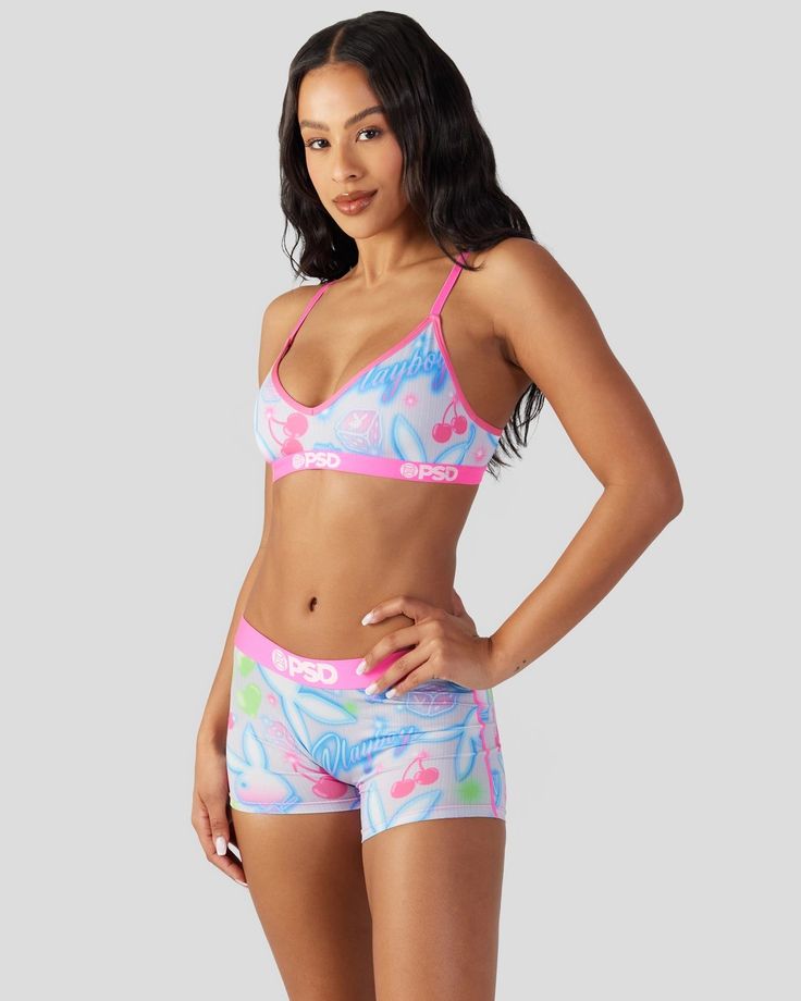 New from Playboy x PSD! Featuring a cute and colorful print perfect for warm-weather seasons, and made of soft and silky fabric, the Summer V-Neck Bralette is light and breathable so you barely feel like it’s there. It gives you full coverage and medium support for those days when you need to wear a bra but really don't want to. | PSD Women's Playboy - Summer Bralette, Size XL Casual Pink V-neck Swimwear, Casual Seamless Swimwear For Spring, Casual Triangle Top Swimwear For Lounging, Casual Multicolor Seamless Swimwear, Casual Multicolor Bra-friendly Swimwear, Casual Bra Friendly Swimwear For Spring, Casual Patterned Swimwear For Spring, Casual Patterned Printed Swimwear, Sporty Printed Swimwear For Spring