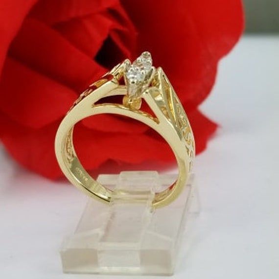 Beautiful engagement ring in 14k gold with three round synthetic zircon stones. Such a beautiful ring for only $379.00. Ring size is adjustable, please note the size in the personalization section of checkout. Hermoso anillo de compromiso en oro de 14k con tres piedras redondas circonias sintéticas. Un anillo tan hermoso por solo $379.00. El tamaño del anillo es ajustable, porfavor anote el tamaño en la sección de personalización en la compra. Elegant Gold Birthstone Ring With Cubic Zirconia, Elegant Gold Cubic Zirconia Birthstone Ring, Elegant Three Stone Birthstone Promise Ring, Luxury Three Stone 14k Gold Ring, Gold Three Stone Round Band Ring, Gold Diamond Three Stone Ring, Luxury 14k Gold Three Stone Ring, Luxury 14k Gold Three-stone Ring, Formal Gold Three Stone Rings