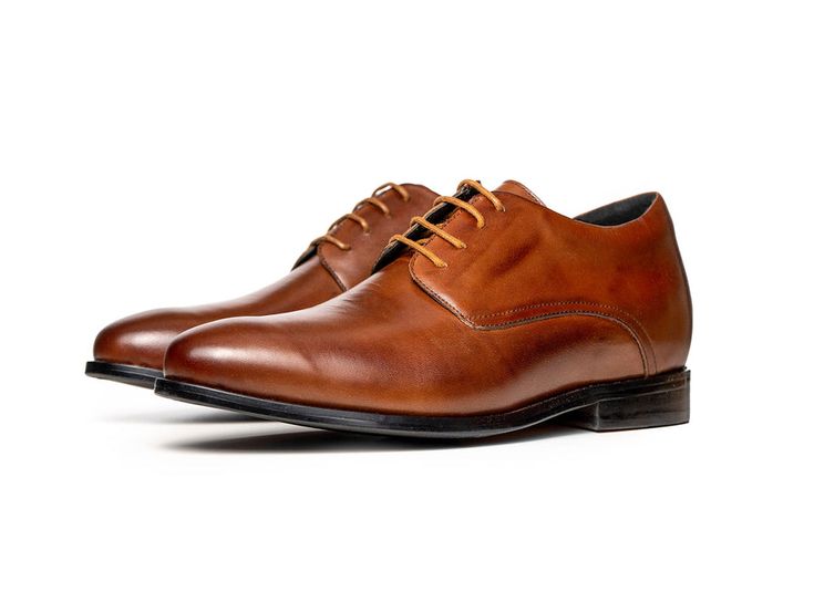 Buy Riesco (2.75") from our Store Dress Shoes for Smart Occasions. Boost Height by 2.75" inches without getting caught. Invisible Boost for Maximum Confidence. Cognac Goodyear Welted Dress Shoes For Semi-formal Occasions, Cognac Plain Toe Oxfords For Semi-formal Occasions, Brown Masculine Oxfords For Formal Occasions, Brown Formal Masculine Oxfords, Cognac Plain Toe Oxfords For Business Casual, Cognac Wingtip Dress Shoes For Formal Occasion, Cognac Wingtip Dress Shoes For Office, Brown Goodyear Welted Derby Shoes For Office, Masculine Brown Oxfords For Semi-formal Occasions