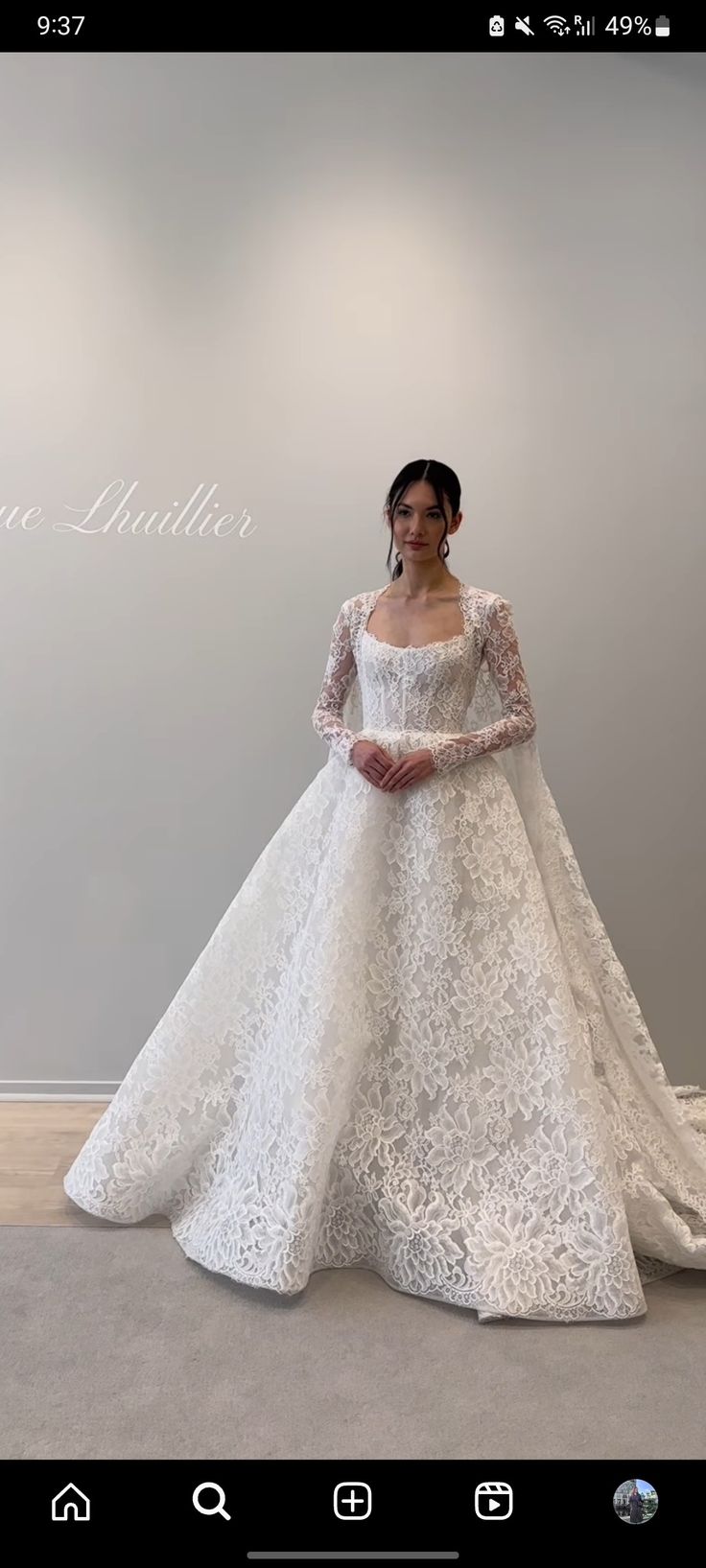 a woman in a white wedding dress is posing for the camera with her hands on her hips