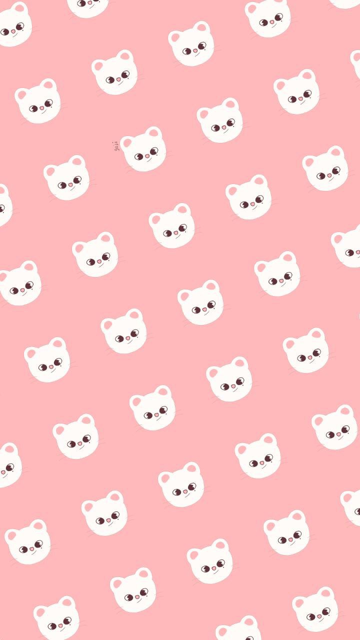 a pink background with white cats on it