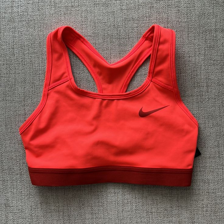 Nike Medium Support Sports Bra Neon Orange Red Color Racer Back No Pads Nor Slots For Padding Nwt Size: Xs 12.5 Inches Pit To Pit / 10.5 Inches Long Functional Red Activewear With Light Support, Red Sportswear Activewear With Light Support, Red Light Support Activewear, Red Stretch Sports Bra For Running, Functional Red Activewear For Running, Red Casual Activewear For Sports, Red Breathable Sports Bra, Red Nike Activewear For Gym, Red Athleisure Sports Bra For Running