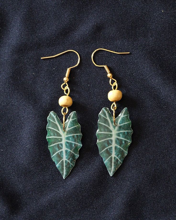 These high quality earrings are a great choice for any plant lover! The lightweight earrings are a great choice for any occasion. Packaging and Shipping All jewelry is gift-ready, nestled in a display box and tied with ribbon. No receipts will be left in the packaging.  Estimated delivery dates are not 100% guaranteed. Most items are premade and will ship out within 1-3 business days after purchase. Some items are custom made and will require more time to get ready to ship. Any change requests will prolong the shipping date. Safety and Care Do not wear your jewelry to swim or shower.  Do not expose your resin jewelry to the sun for a prolonged period, it can cause it to be discolored and softened.  Wipe clean with a soft, non-abrasive cloth. Do not wear your jewelry to sleep. Wash with mil Nickel Free Botanical Earrings For Gifts, Nickel Free Botanical Earrings As Gift, Nickel-free Botanical Earrings As Gift, Nickel-free Botanical Style Earrings As Gift, Leaf-shaped Earrings For Gift, Leaf-shaped Jewelry Gift, Botanical Dangle Earrings For Gift, Botanical Dangle Earrings As Gift, Botanical Leaf-shaped Earrings With Ear Wire