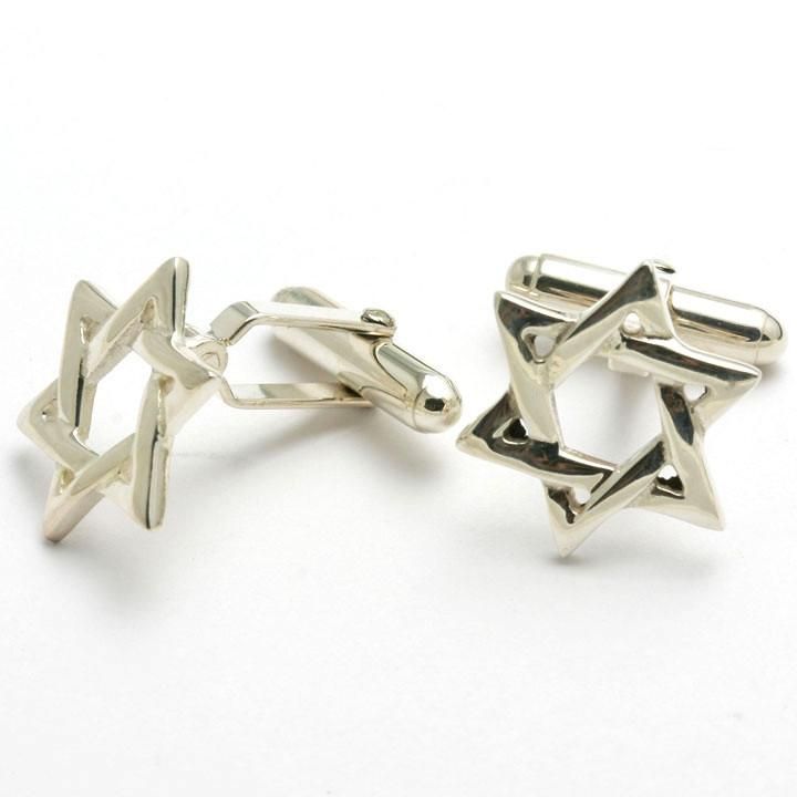 This is a set of Star of David cufflinks in 925 sterling silver. The design is a very classic woven star design in a nice polished finish. These make a great accessory for a bar mitzvah or other festive occasion. Length: 3/4" Width: 5/8" Jewish Star, Star Design, Cufflinks Men, Star Of David, Bar Mitzvah, A Bar, Star Designs, Cufflinks, 925 Sterling Silver