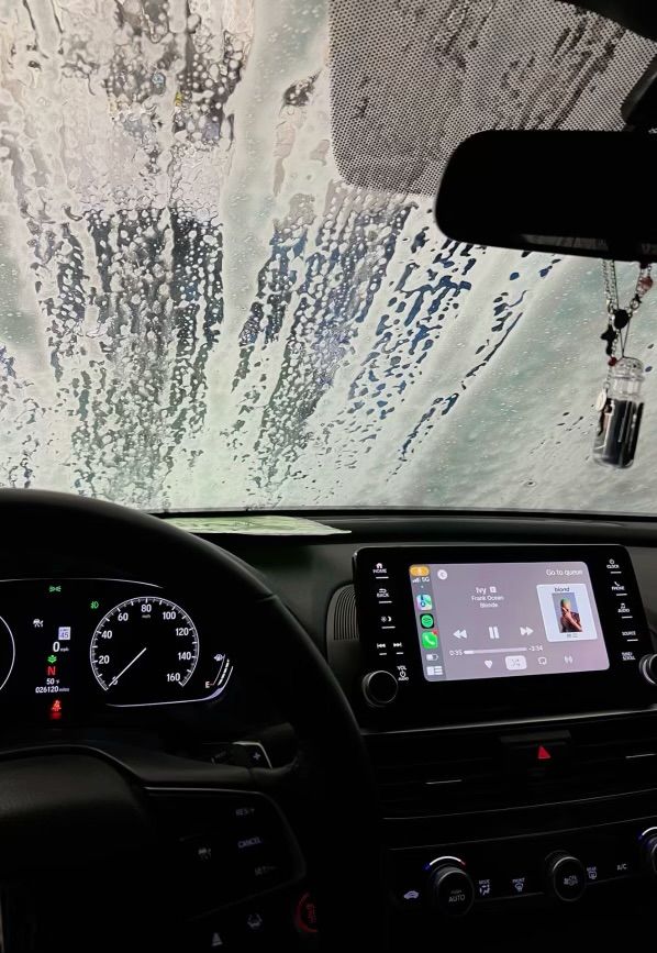 the dashboard of a car with an image of water on it's windshield and dash board