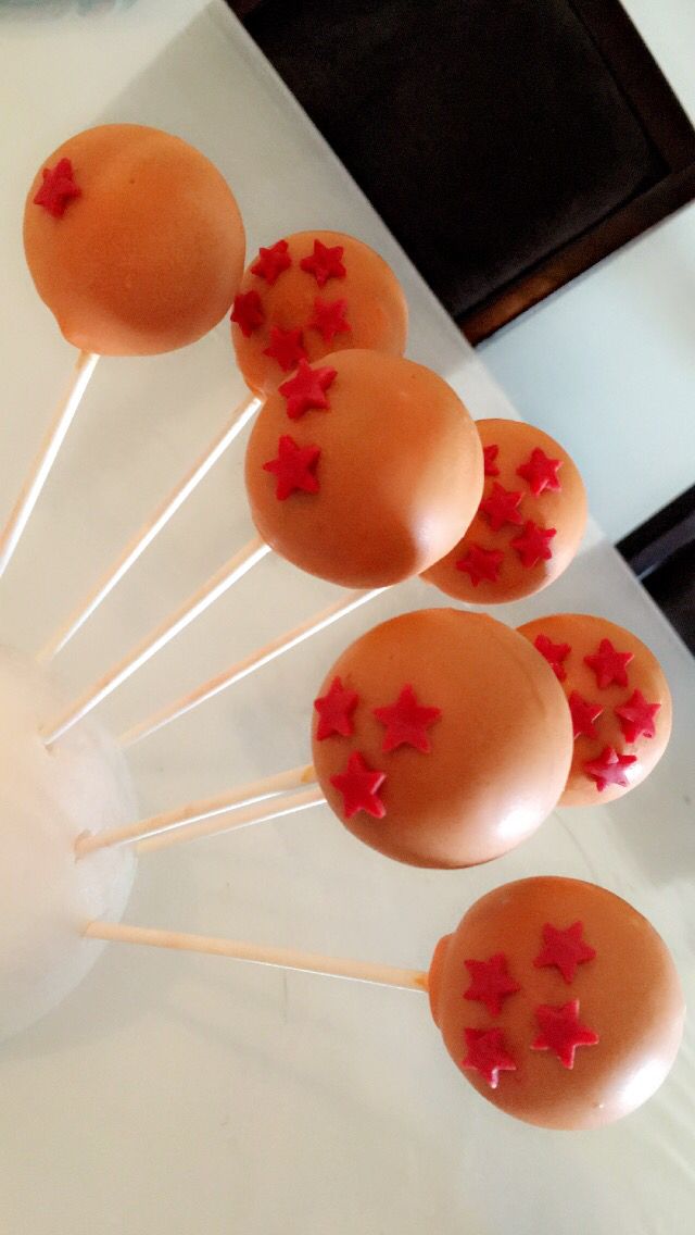 some cake pops with red stars on them