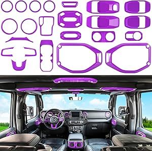 the interior of a vehicle with purple trims and dash stickers in front of it