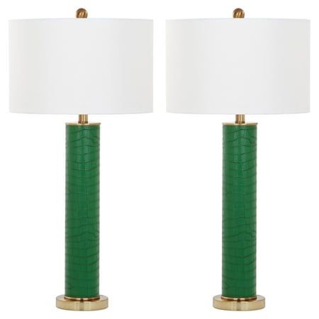 two green lamps with white shades on them