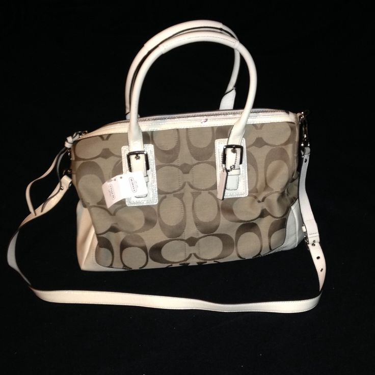 Coach Hampton Signature Satchel In Brown/Khaki/White. Brand New. Bag Has Brown Signature "C"S All Over, With A White Patent Leather Trim. Comes With Long Shoulder Strap. Ahthentic. Purchased From The Coach Store. **Open To Offers!!** Designer White Bag With Adjustable Strap, White Crossbody Shoulder Bag With Silver-tone Hardware, White Shoulder Bag With Silver-tone Hardware, White Shoulder Bag With Silver-tone Hardware For Travel, White Shoulder Bag With Silver-tone Hardware For Daily Use, White Designer Bag With Top Carry Handle, White Designer Bags With Top Carry Handle, Designer Cream Bag With Silver-tone Hardware, White Bags With Silver-tone Hardware And Double Handle