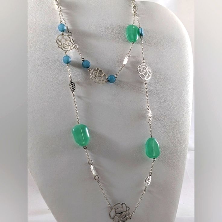 This Is A Delicate, Lightweight Chain And Bead Necklace. Silver Tone Roses, Leaves, And Acrylic Beads That Remind You Of The Colors Of The Ocean. Nwot (I Have 2 Available) Elegant Blue Beaded Chain Necklace, Elegant Blue Beaded Necklaces With Chain, Elegant Blue Beaded Necklace With Adjustable Chain, Elegant Blue Long Chain Necklace, Elegant Long Blue Chain Necklace, Elegant Blue Metal Chain Necklace, Blue Long Necklace For Gift, Elegant Turquoise Long Necklace For Gift, Blue Beaded Long Necklace With Adjustable Chain