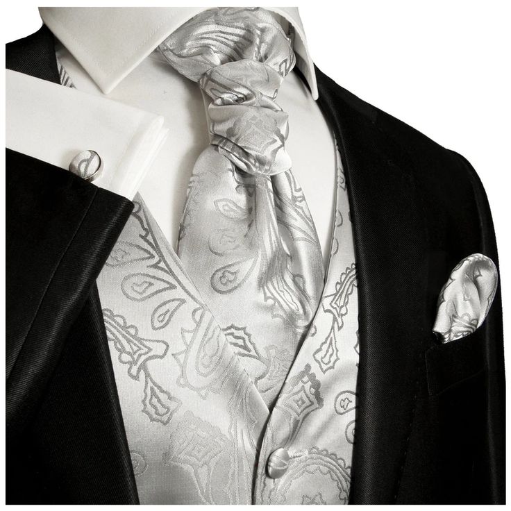 Spice up your formal suit with an elegant silver paisley tuxedo vest set. This silver paisley tuxedo vest set includes the vest, choice of neckwear,, pocket square and cufflinks. Full back. 100% microfiber . Imported. Silver And Black Prom Suit, Silver Tuxedo, Paisley Tuxedo, Silver Suit, Business Suit Vest, Mens Dress Vests, Wedding Vest, Wedding Waistcoats, Ascot Ties