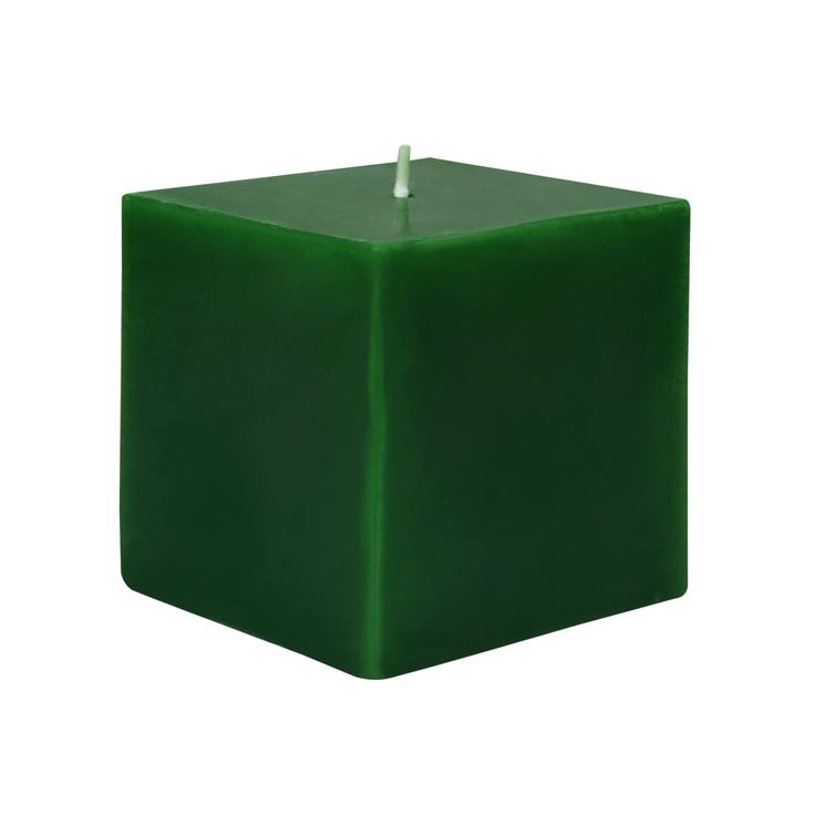 a green square candle holder on a white background