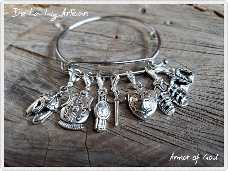 Silver Armor of God Charm Bangle or Necklace Material:  Silver Finish Alloy  Ephesians 6:10-20 scripture brought to life.  The Armor of God symbols to encourage & share your faith.  Each piece comes with a Bible verse card.   BRACELET This bangle comes with 7 charms.  Fits most wrists.  The charms are attached to a lobster clasp so you can easily add or remove them to your Charm Jewelry Pieces. This is perfect to start a charm bracelet collection!  Just clip on the charms.  Mix & Match your char Adjustable Medieval Style Bangle Jewelry, Medieval Style Bangle Jewelry Gift, Adjustable Medieval Style Nickel-free Jewelry, God Symbols, Christian Charm Bracelet, Ballet Earrings, Silver Armor, Bible Verse Jewelry, Scripture Jewelry