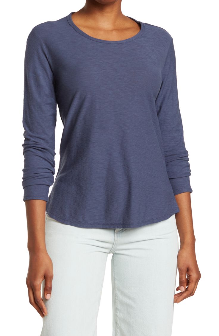 Slip into this classic crew neck long sleeve shirt when lounging at home or when out and about for a casual, comfy look. 25" length (size 1) Crew neck Long sleeves Slips on over head 51% cotton, 49% modal Machine wash cold Imported