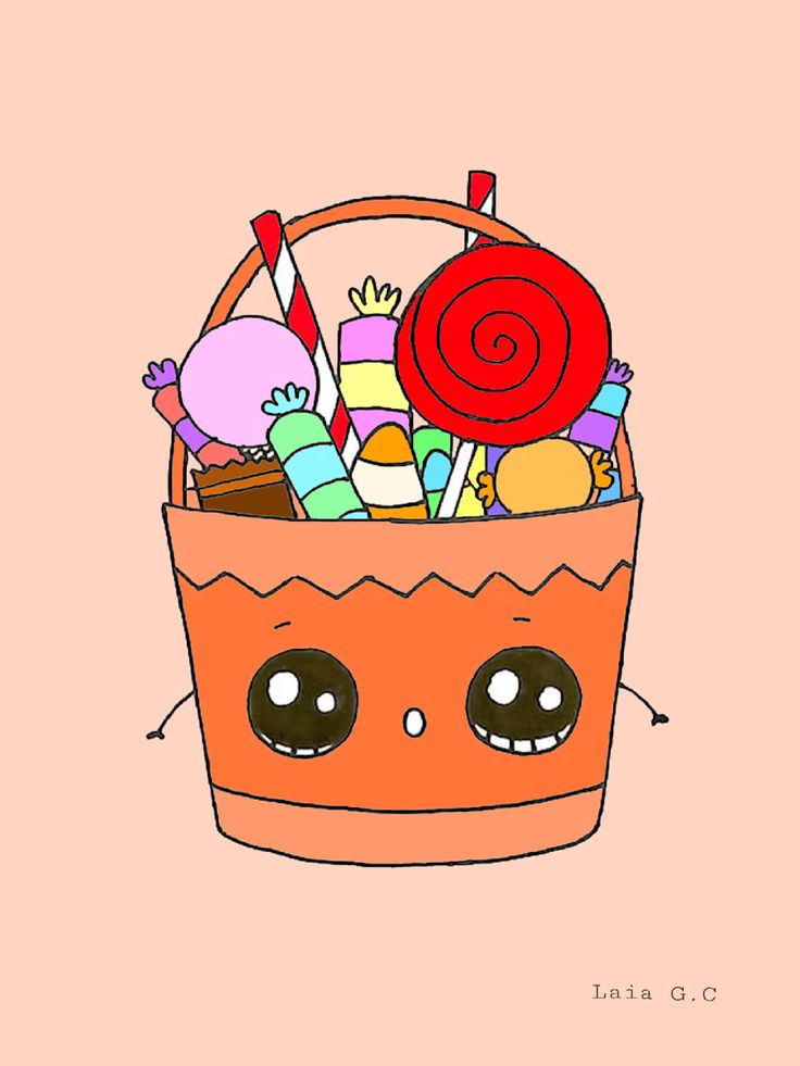 an orange basket filled with lots of candy and lollipops on top of a pink background