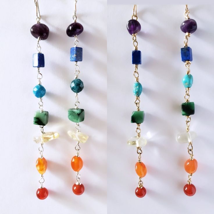 Vibrant gemstones wired wrapped in your choice of 14k goldfilled or sterling silver wire. Gems are rich in color and coordinate with the seven energetic Chakra colors. From top to bottom, it includes amethyst, lapis, apatite, (turquoise for gold version),  jade, citrine, carnelian and red agate. Earrings hang 4" in length.  It's said that wearing or holding certain stones helps keep us more in balanced with our emotions and attract good energy. Each stone coraltes with a part of the body from the crown (amethyst) which is said to help us see the bigger picture, to the root  (red agate) which lends to keeping us grounded.   Even if you dont subcribe to the notion that a stone can have any influence over your energy centers. Wear them because these fun, vibrant, gorgeous hued gems will certa Yellow Gold Wire Wrapped Jewelry For Healing, Multicolor 14k Gold Filled Earrings For Gift, Spiritual Gemstone Jewelry With Silver Plated Wire, Adjustable Wire Wrapped Spiritual Earrings, Gold Spiritual Earrings With Gemstone Beads, Multicolor Wire Wrapped Sterling Silver Earrings, Fusion Wire Wrapped Dangle Jewelry, Hand Wrapped Dangle Jewelry In Silver Plated Wire, Hand Wrapped Silver Plated Dangle Jewelry