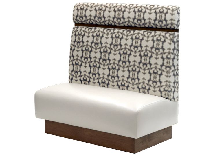 a white and brown upholstered chair on a white background with an intricate pattern