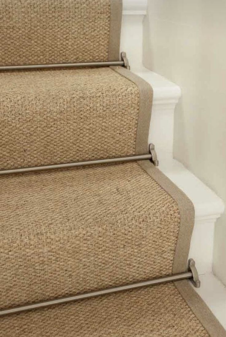 a close up view of some carpeted stairs