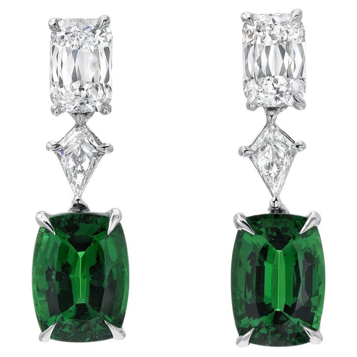 Rare 3.26 Carat Tsavorite Garnet & Diamond Platinum Earrings – A Masterpiece of Elegance - Merkaba Beverly Hills. Introducing an exceptional pair of Tsavorite Garnet and diamond earrings, designed to celebrate elegance and sophistication. This unique creation features 3.26 carats of vivid green cushion-cut Tsavorite Garnets, accented by 1.31 carats of diamonds in an intricate and luxurious design. Crafted with unparalleled precision in the USA, these earrings are a true testament to fine craftsm Green Sapphire Earrings, Luxury Jewelry Collection, Gold Diamond Drop Earrings, Chandelier Gold, Yellow Gold Diamond Earrings, Emerald Diamond Earrings, Pink Sapphire Earrings, Vintage Drop Earrings, Sapphire And Diamond Earrings