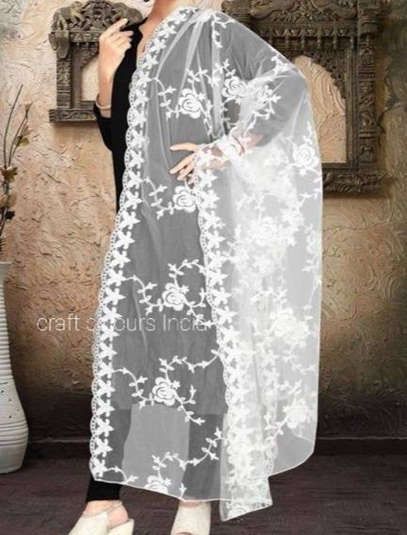 Rose embroidered white net dupatta Elegant White Embroidered Fabric With Dupatta, White Floral Embroidered Dupatta For Eid, Elegant White Embroidered Dupatta Fabric, White Organza Dupatta With Chikankari Embroidery, Unstitched White Organza Dupatta, White Chikankari Embroidered Organza Dupatta, White Lace Organza Dupatta, White Lace Dupatta With Resham Embroidery, White Sheer Organza Dupatta