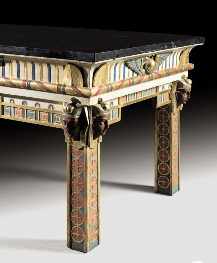 an elaborately decorated table with black top