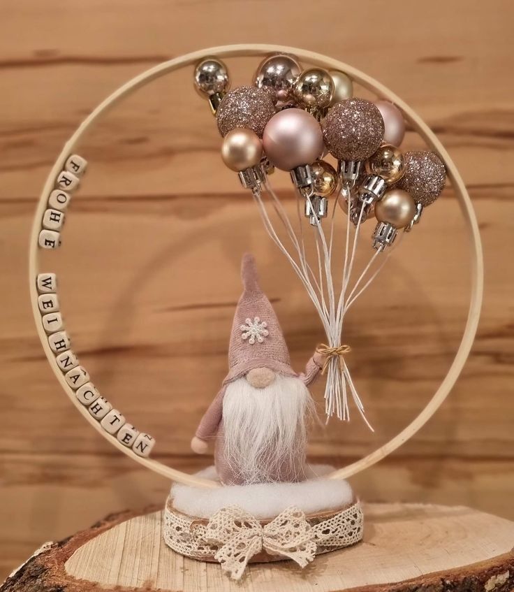 an image of a gnome with balloons in the air on a tree stump ornament