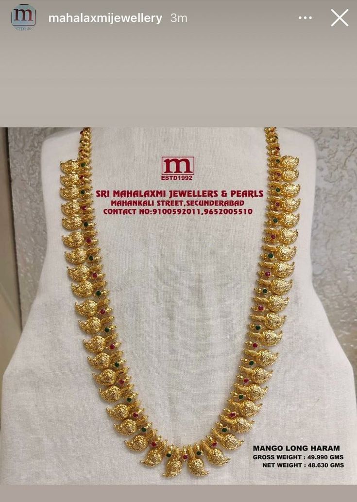 Very Light Weight New Collection Added Mango Long Haram In The Stock Studded with Ruby And Emerald. VISIT OUR SHOWROOM FOR FULL RANGE OF WEDDING COLLECTION AT WHOLESALE PRICES Please call WHATSAPP VIDEO CALL NO. 9100592011, 9652005510 www.srimahalaxmijewellers.in #SriMahalaxmiJewellers #MahalaxmiJewellers #longharam #mangolongharam #mangoharam #tradional #tradionalwear #southindian #southindianwear #bridalwear #partywear #bridaljewellery Long Mango Haram Designs Indian, Plain Haram Gold, Gold Mango Haram Designs With Grams, Light Weight Gold Long Harams, Light Weight Mango Haram Designs, Long Harams Under 40 Grams, Latest Mango Haram Designs With Grams, One Gram Gold Jewellery With Price Long Haram, Kasulaperu Jewellery With Grams