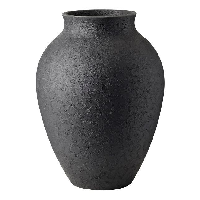 a black vase is shown on a white background