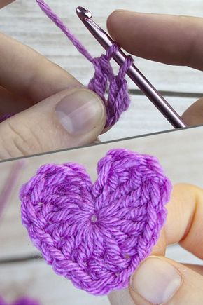 someone is crocheting a heart shaped piece of yarn with a knitting needle in the shape of a heart