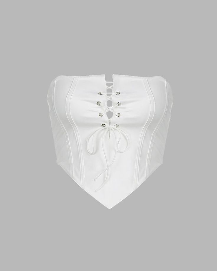 Details: Corset top with front shoelace designTop Length: CroppedSleeve Length: SleevelessMaterials:95% Polyester + 5% Spandex Fitted Lace-up Back Top For Spring, Sleeveless Bandage White Corset, White Sleeveless Bandage Corset, Sleeveless Party Top With Lace-up Back, Spring Stretch Tops With Lace-up Back, Sleeveless Lace-up Back Top For Party, Fitted Top With Lace-up Back For Party, Fitted Lace-up Back Top For Party, Sleeveless Top With Lace-up Back For Spring