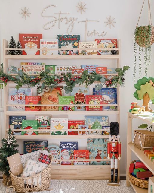 there is a book shelf with many books on it and christmas decorations in the corner