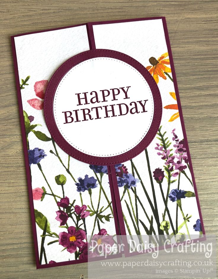 a happy birthday card with flowers on it