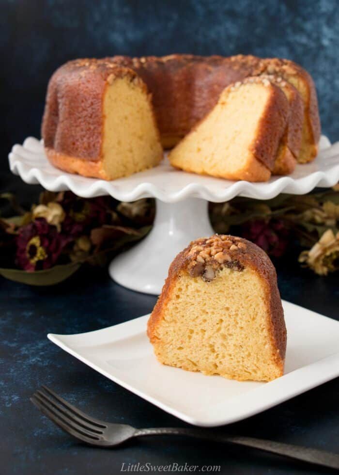 a bundt cake on a plate with a slice cut out