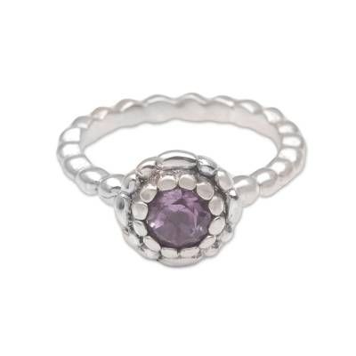 A polished beaded band hosts a pretty blossom in this ring from Bali's Wayan Lasti. The crown features a sparkling round amethyst set within layers of silver petals. Artisans craft the ring by hand from sterling silver. Silver Amethyst Birthstone Ring With Round Stone, Silver Amethyst Birthstone Ring, Adjustable Amethyst Birthstone Ring, Elegant Stackable Adjustable Amethyst Ring, Silver Amethyst Stackable Jewelry, Adjustable Amethyst Ring With Accent Stones, Silver Amethyst Rings With Faceted Detail, Dainty Adjustable Amethyst Ring, Silver Stackable Amethyst Jewelry