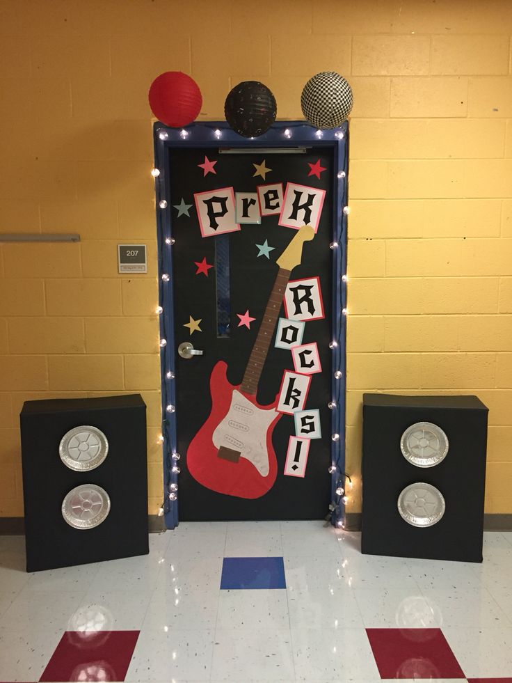 a rock band themed door with speakers and lights