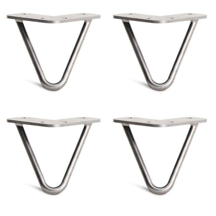 four metal shelf brackets are shown on a white background with clippings in the shape of trianglees