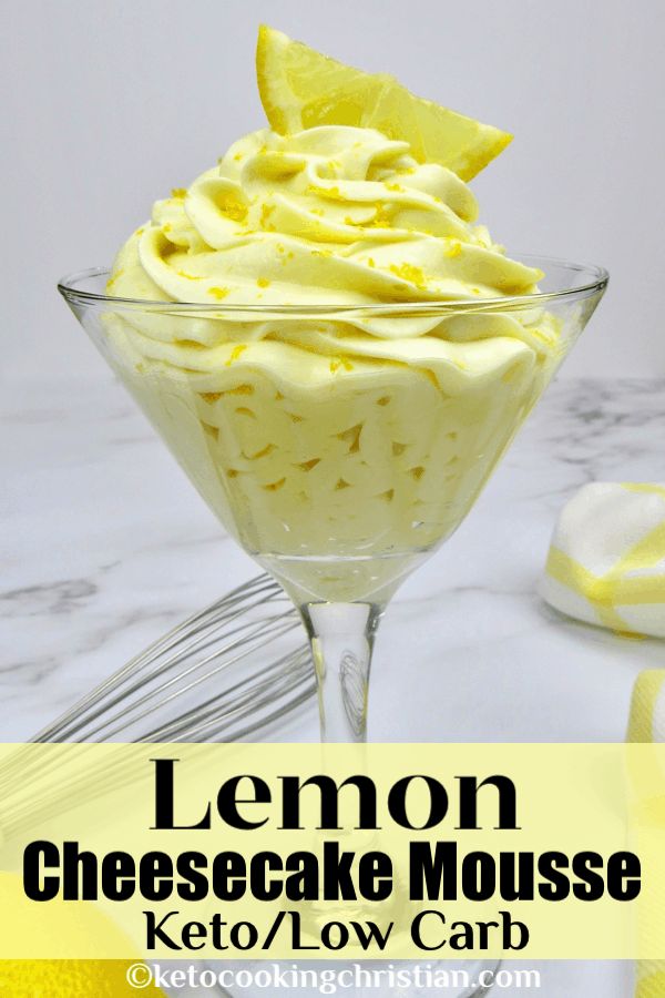 lemon cheesecake mousse in a glass bowl on a marble counter top with text overlay that reads, lemon cheesecake mousse low carb