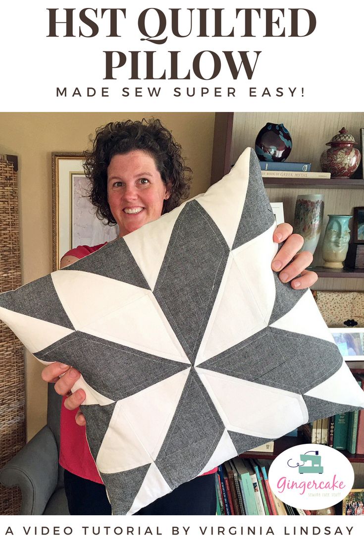 a woman is holding up a pillow made from an old quilt and the words, hist quilted pillow made sew super easy