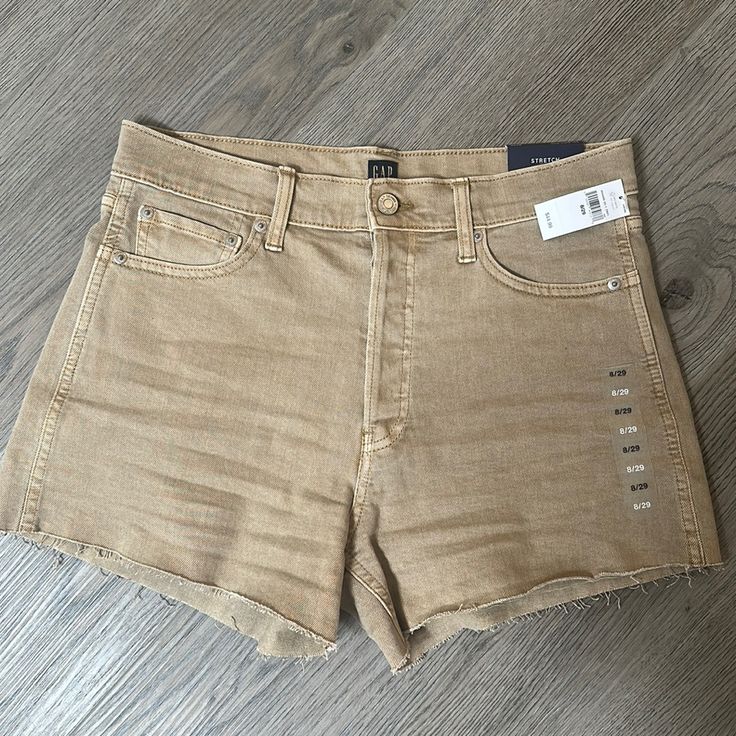 Brand New Gap Tan Denim Shorts. They’re In Great Condition, Never Been Worn. They Still Have The Tags On Them. There’s Nothing Wrong With Them, I Just Didn’t Like How They Fit On Me. They’re A Size 8/29 Smoke And Pet Free Home Please Ask If You Have Any Questions Gap Cotton Cutoff Jean Shorts, Gap Cutoff Shorts For Summer, Trendy Cutoff Jean Shorts By Gap, Gap Summer Jean Shorts, Gap Casual Jean Shorts For Summer, Gap Short Summer Jeans, Casual Gap Jean Shorts For Summer, Gap Summer Short Jeans, Casual Summer Jean Shorts By Gap