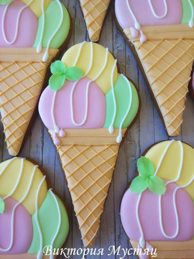 decorated cookies in the shape of ice cream cones