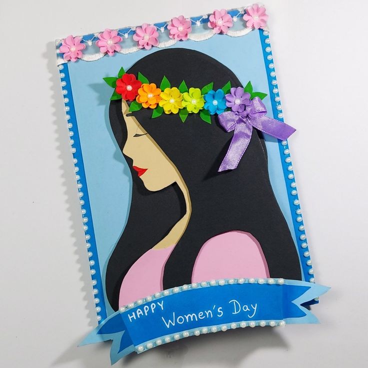 a woman's day card with flowers in her hair and a ribbon around it