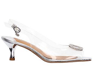 a women's clear high heeled shoe with metal accents