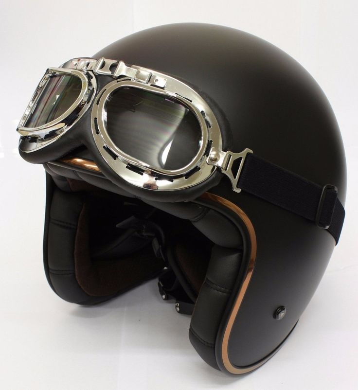 a helmet with goggles is shown on a white background