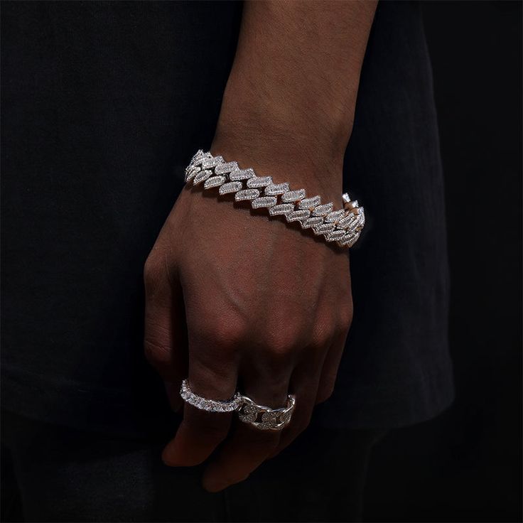 Set the tone for your night out with the Ice Dazzle "Baguette Cuban Link" bracelet. Available in multiple sizes, the Cuban link chain is a classic design, but we're bringing it back with an extra touch of shine and dazzle with our crystal fusion iced Cuban links and White Gold plated finish.