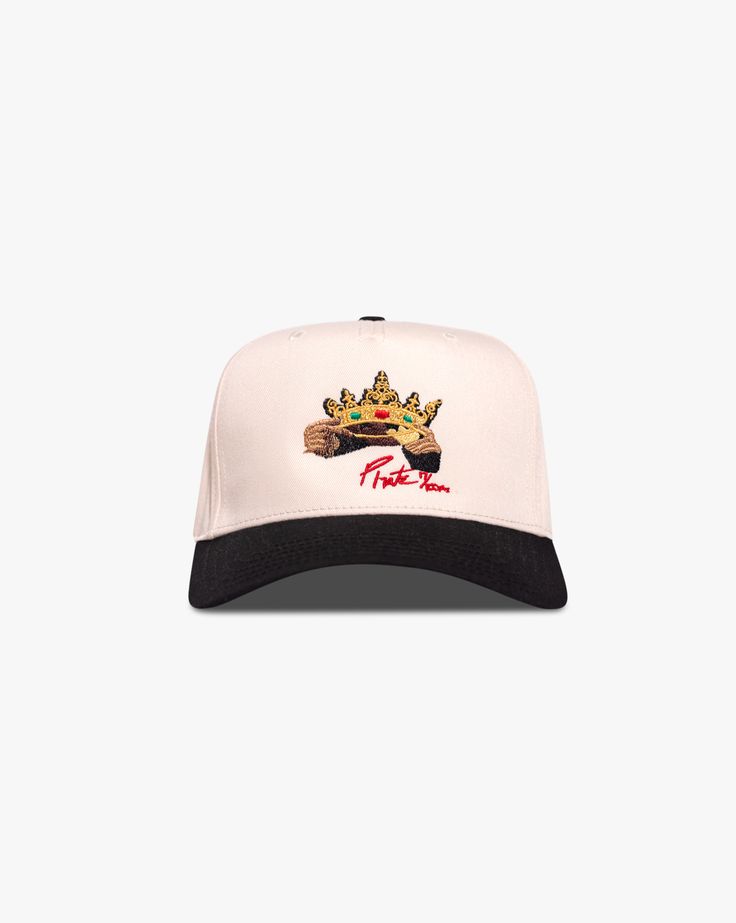 Pirate Castles Crown Hat Size: Adjustable Snapback Cap Color: Cream/Black Front Pirate Castles Crown Design Embroidery Stitch Count: 5,398 Embroidery Color: Gold, Red, Emerald Green, Brown, Black Embroidered Black Fitted Cap, Black Embroidered Snapback Hat, Black Embroidered Flat Brim Baseball Cap, Black Embroidered Fitted Cap, Black Embroidered Baseball Cap With Curved Brim, Embroidered Black Baseball Cap, Embroidered Black Snapback Hat With Flat Brim, Black Embroidered Flat Bill Hats, Black Embroidered Flat Bill Fitted Hat