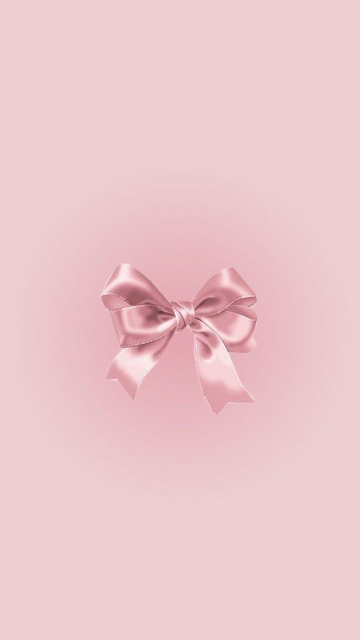 a pink background with a large bow on the top and bottom part of the image