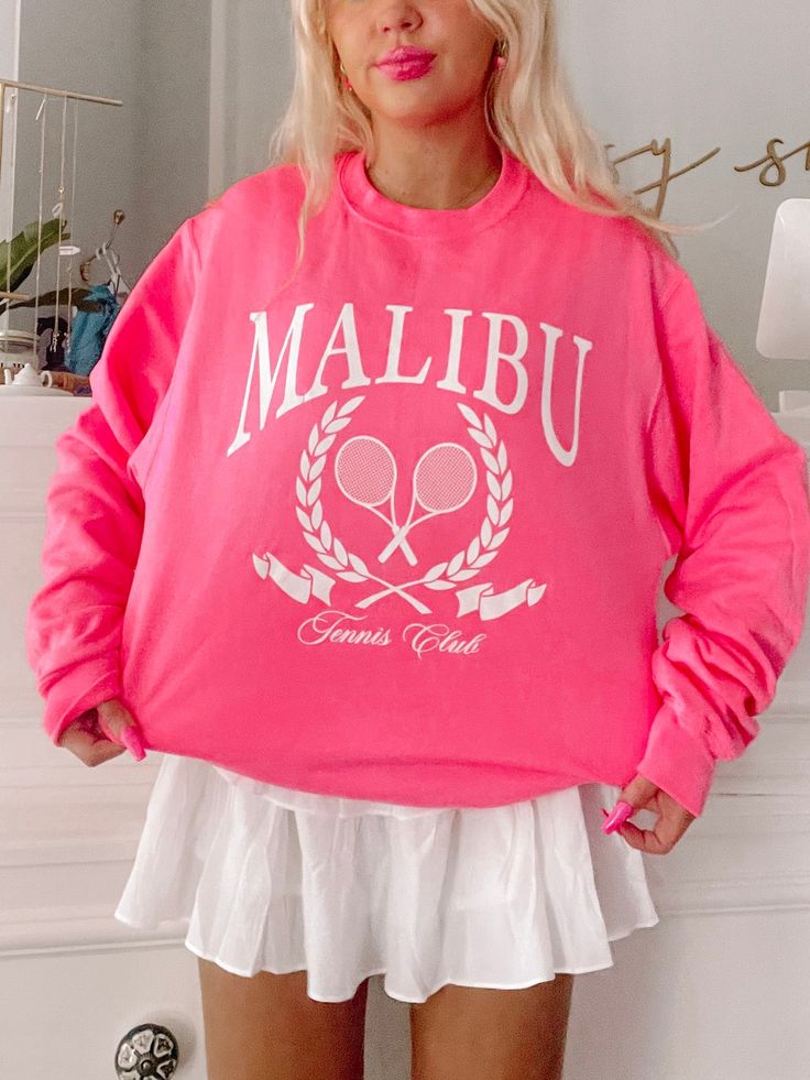 Malibu Tennis Club Pink Crewneck | Sassy Shortcake Boutique | sassyshortcake.com Pink Athleisure Sweatshirt For Leisure, Pink Crew Neck Sweatshirt For Leisure, Pink Crew Neck Sweatshirt For Sports, Pink Sweatshirt For College In Spring, Pink Spring College Sweatshirt, Pink Spring Sweatshirt For College, Pink Sports Sweatshirt With Graphic Print, Long Sleeve Graphic Print Sweatshirt For Tennis, Graphic Print Long Sleeve Sweatshirt For Tennis