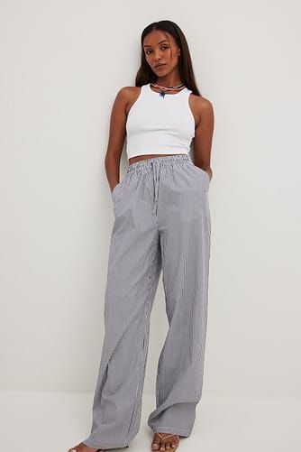 Elastic Waist Linen Trousers White | NA-KD Chic Wide Leg Pants With Drawstring And Relaxed Fit, Chic Wide Leg Pants With Drawstring In Relaxed Fit, Summer Wide Leg Pants With Drawstring For Work, Summer Wide Leg Drawstring Pants For Work, Trendy Cotton Bottoms With Tie Waist, Cotton Wide Leg Pants With Tie Waist For Work, Chic Drawstring Cotton Pants, Relaxed Fit Cotton Pants With Tie Waist, Casual Wide Leg Pants With Drawstring For Work