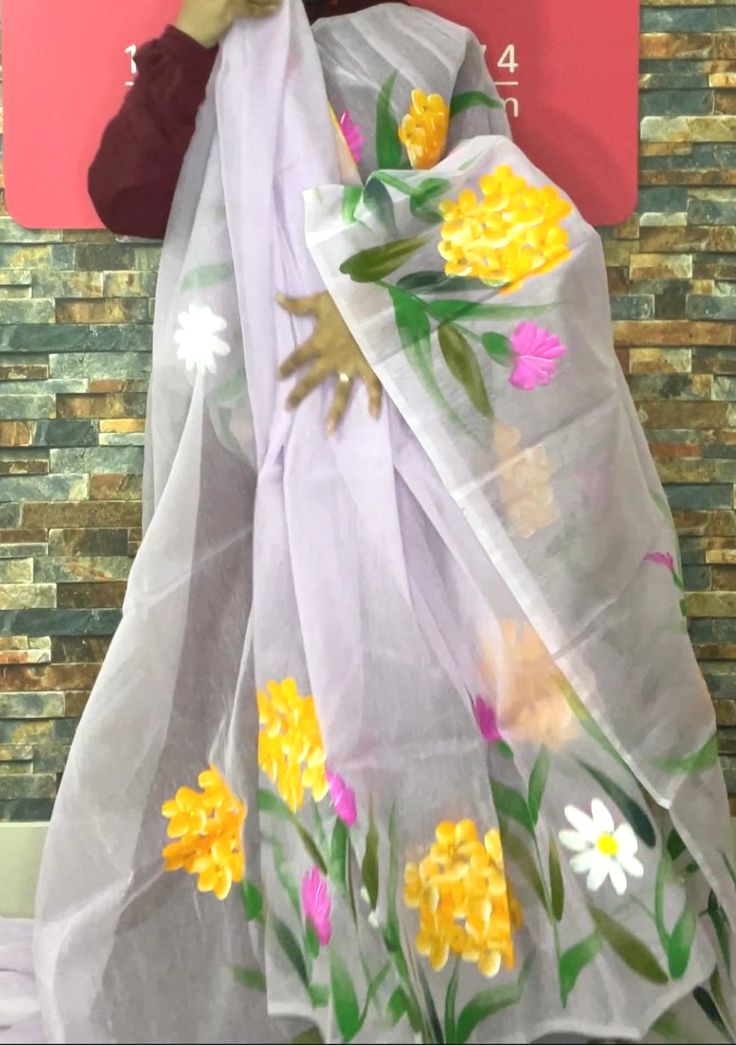 This Boutique Designer Occasional Hand Painted Mixed Cotton Saree is a perfect and unique choice for your occasional and party wear. Cotton Silk or Mixed Cotton Saree. Delicate Multicolored Hand Painted Flowers Work. No Blouse Piece. Color: There might be slight color variation due to lighting and flashes while photo shooting. The color may also vary because of different screen resolutions. Wash Care: Wash With Cold Water. Traditional Sheer Dupatta Blouse Piece For Spring, Traditional Blouse With Sheer Dupatta For Spring, Summer Purple Dress With Dupatta, Multicolor Saree Dresses For Spring, Summer Party Saree With Sheer Dupatta, Summer Party Saree With Dupatta, Semi-stitched Summer Saree With Sheer Dupatta, Summer Semi-stitched Saree With Sheer Dupatta, Semi-stitched Sheer Dupatta Saree For Summer