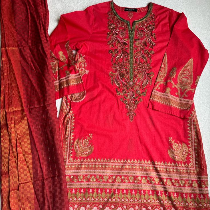 Brand New With Tag In Perfect Condition Pakistani Kurta With Matching Dupatta ! Great For Formal Or Casual Wear Size Is Large Bust Measurement Is 23” Pit To Pit And Length Is 43” Long Great For Ramadan Or Eid Party. Unstitched Red Kurta For Summer, Red Unstitched Lawn Suit For Summer, Unstitched Red Lawn Suit For Summer, Red Unstitched Summer Kurta, Red Cotton Lawn Suit With Resham Embroidery, Red Cotton Lawn Suit For Eid, Fitted Red Lawn Suit With Printed Motifs, Red Lawn Suit For Summer Festivities, Red Long Sleeve Lawn Suit With Self Design